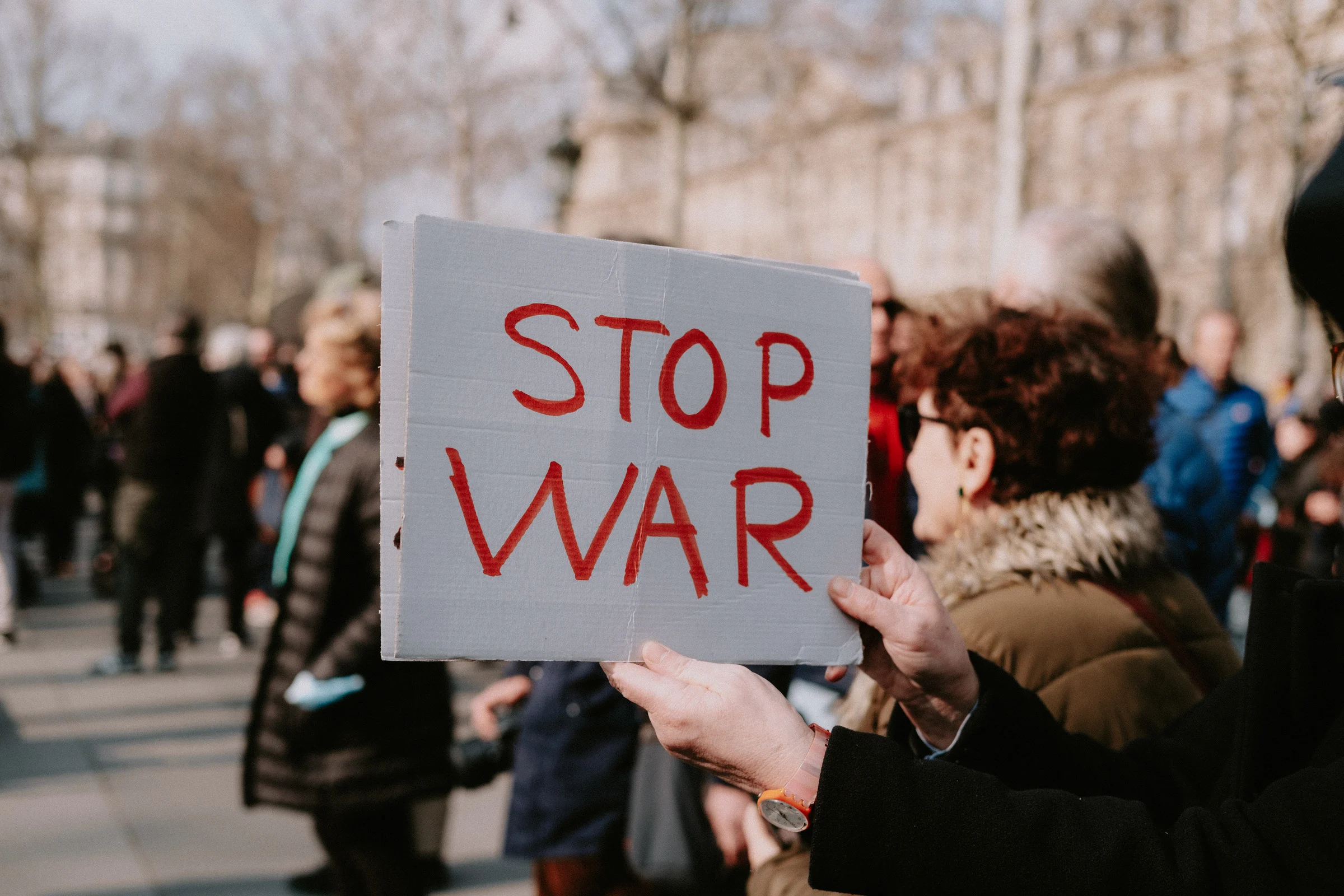 Sign Stop War on Protest Against War 